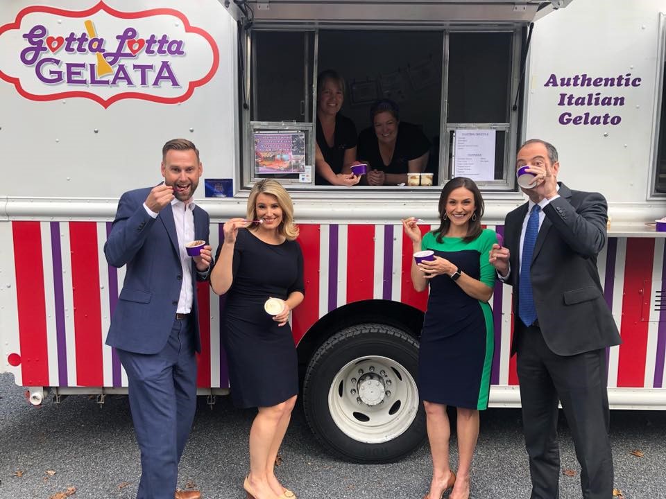 catering for corporate events, business people standing in front of the Gotta Lotta Gelata food truck